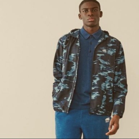 Cotton Denim Blue Peppered Polo Shirt by Roots - Picture 4 of 5